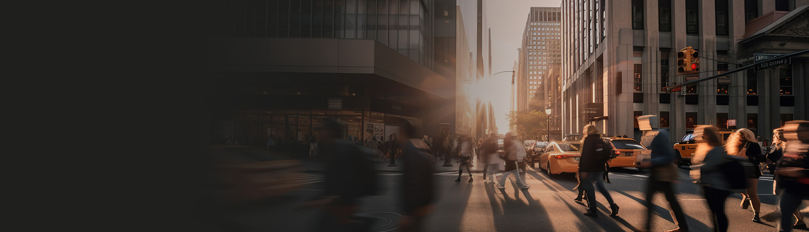 Light filtering through a busy pedestrian intersection in a city