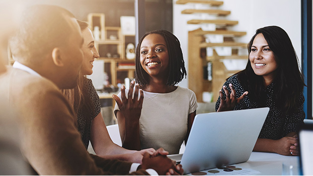 Woman using hand to express herself in group meeting