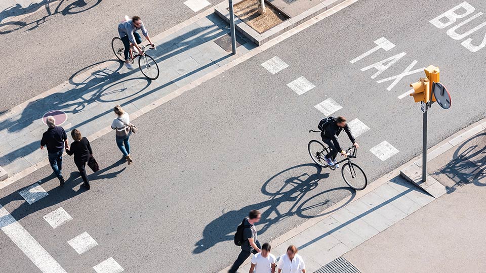 Street from above with cyclists and pedestrians